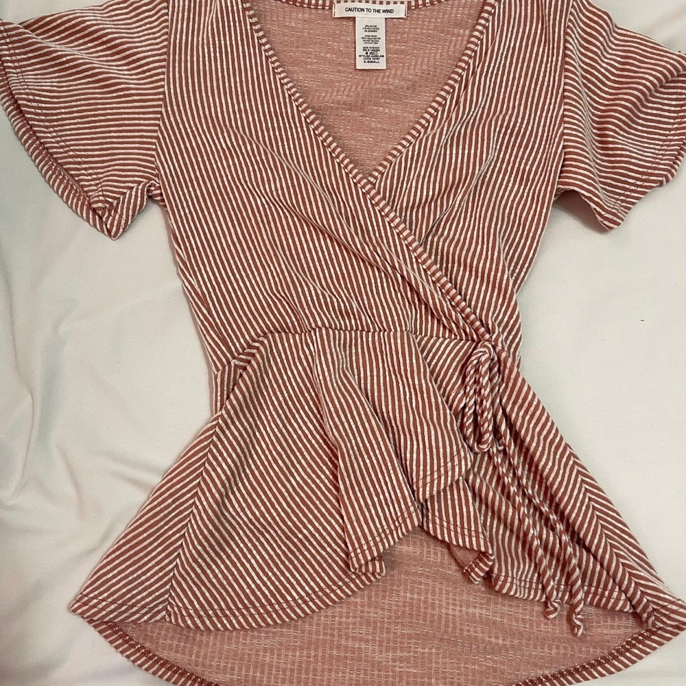 Caution to the wind top